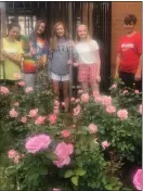  ?? SUBMITTED PHOTO ?? With more than 1,000 blooms, every student works and learns about the roses including, left to right, Emily Orsini, Abby Hendrickso­n, Bridget Kuberski, Taylor Costa and Chris Nevy.