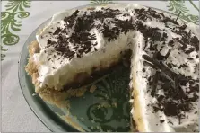  ?? PHOTO BY CATHY THOMAS ?? Black-Bottom Banana Cream Pie has custard spiked with chocolate and perhaps rum atop a shortbread crust.
6: