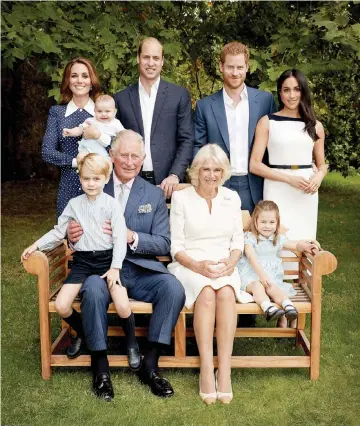  ??  ?? Prince Charles poses for an official portrait to mark his 70th birthday in the gardens of Clarence House, with Camilla, Prince Willliam, Catherine, Prince George, Princess Charlotte, Prince Louis, Prince Harry and Meghan in London, England, in last Sept 5. — Clarence House/Handout via Reuters
