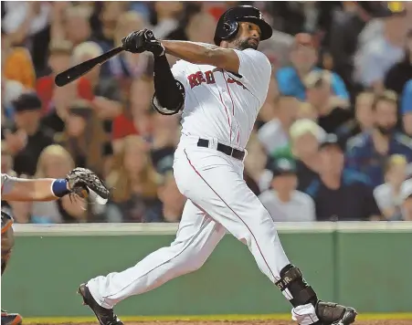  ?? STAFF PHOTO BY STUART CAHILL ?? DEEP IMPACT: Jackie Bradley Jr. connects for his two-run home run in the eighth inning last night at Fenway that sent the Red Sox to a 5-3 victory against the Detroit Tigers.