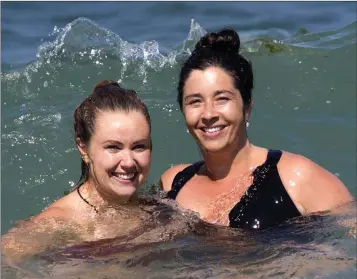  ??  ?? Louise Rossiter and Karen Whelan enjoying a dip at Ladys Cove, Greystones.