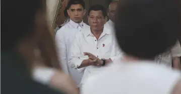  ??  ?? PRESIDENT Rodrigo R. Duterte arrives at the Reception Hall of Malacañan Palace on Dec. 12 to meet with business leaders