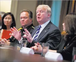  ?? Evan Vucci ?? The Associated Press President Donald Trump speaks during a roundtable on California immigratio­n policy in the Cabinet Room of the White House on Wednesday.