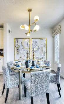  ??  ?? The dining area boasts the blue and gold theme of the show home.