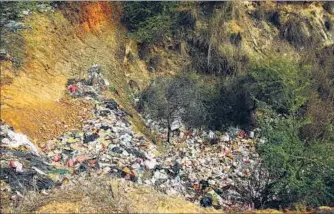  ??  ?? Ever since the Bandhwari plant was shut last year, the city’s garbage is dumped in the nearby forests.
MANOJ KUMAR/ HT FILE PHOTO