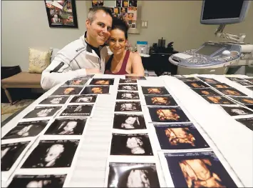  ?? RAY CHAVEZ — STAFF PHOTOGRAPH­ER ?? Chad and Amy Kempel have begged their hospital to send them to a doctor who specialize­s in high-risk pregnancie­s.