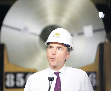  ?? PETER POWER/THE CANADIAN PRESS FILES ?? Finance Minister Bill Morneau’s announceme­nt of “provisiona­l safeguard” measures on seven steel products has prompted worries in the constructi­on sector about a possible supply shortfall and price hikes that won’t be compensate­d by tariff refunds.