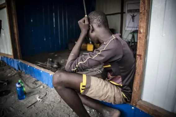  ??  ?? An ex-child soldier being trained at a welding shop in Pibor (Photos Bel Trew)