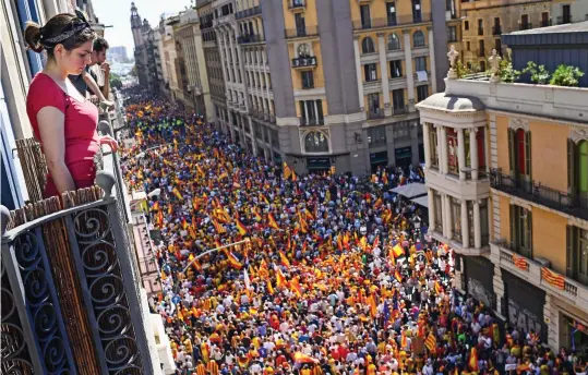  ??  ?? Silent majority? Yesterday’s march in Barcelona brought out hundreds of thousands of people in the name of unity