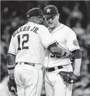  ?? Mark Mulligan / Staff photograph­er ?? Astros manager Dusty Baker pulls reliever Joe Smith on Saturday after he allowed two runs in the eighth.