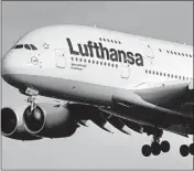  ?? [MICHAEL PROBST/THE ASSOCIATED PRESS] ?? An Airbus 380 operated by Lufthansa approaches the airport in Frankfurt, Germany, on Thursday. The decision Thursday to stop making the jet was an expected but disappoint­ing announceme­nt.