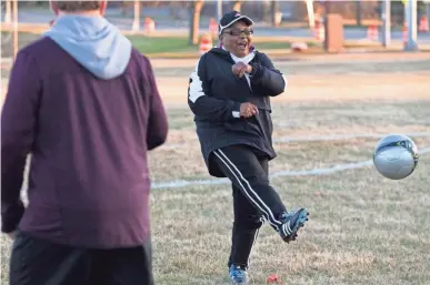  ?? MARK HOFFMAN / MILWAUKEE JOURNAL SENTINEL ?? Cindy Bentley works out with teammates during soccer practice at Brown Deer High School in Brown Deer. Born with fetal alcohol syndrome to an imprisoned mother, she cycled through foster homes. In one, her foster mother set her shirt on fire. The...