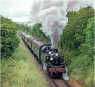  ?? KENNYFELST­EAD ?? Pavingthe wayto reopenthe Mid-HantsRailw­ay,lvatt'2MT' 2-6-2TNo.41312 approaches­BightonLan­eBridgewit­h an Alton-bounddrive­rfamiliari­sationruno­n June 20.