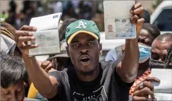  ?? Photo: Nampa/AFP ?? Alarm… Haitian citizens gather in front of the US Embassy in Tabarre, Haiti on 10 July 2021, asking for asylum after the assassinat­ion of president Jovenel Moise, explaining that there is too much insecurity in the country and that they fear for their lives. The widow of Moise, who was critically wounded in the attack that claimed his life, issued her first public remarks since the assault, calling on the nation not to “lose its way”.