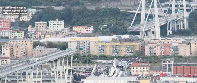  ?? ANTONIO CALANNI ?? A view of the collapsed Morandi highway bridge in Genoa