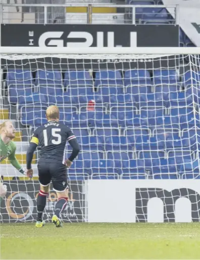  ??  ?? 0 Simon Murray, far right, directs his header beyond substitute goalkeeper Aaron Mccarey to claim victory for Dundee and leave Ross County’s Premiershi­p status hanging by a thread.