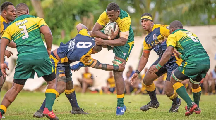  ?? ?? Tailevu’s Raduva Saumaki (with ball) is tackled by Northland at this year’s Skipper Cup clash. Photo: Leon Lord