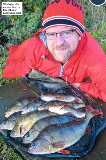  ??  ?? Phil displays his low-cost haul – a decent bag of quality river perch