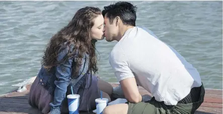  ?? NETFLIX ?? Katherine Langford and Ross Butler in 13 Reasons Why. The teen series has stirred up controvers­y for both its seasons, which cover such difficult topics as sexual assault, school shootings and bullying.