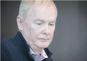  ?? JONATHAN HAYWARD/ THE CANADIAN PRESS ?? John Furlong pauses for a moment after addressing the media from his lawyer’s office in Vancouver on Tuesday. Furlong says he has been vindicated by the courts after the last of three sexual abuse lawsuits was thrown out Monday.