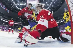  ?? JULIO CORTEZ / THE ASSOCIATED PRESS FILES ?? Montreal goaltender Carey Price helped lift Canada to a gold medal at the 2014 Sochi Olympics.