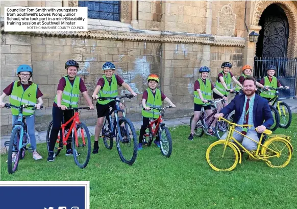  ?? NOTTINGHAM­SHIRE COUNTY COUNCIL ?? Councillor Tom Smith with youngsters from Southwell’s Lowes Wong Junior School, who took part in a mini-bikeabilit­y training session at Southwell Minster