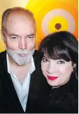  ??  ?? Douglas Coupland, here with fellow artist Angela Grossmann, saw his target painting almost triple its $10,000 estimate at the Vancouver Art Gallery auction.