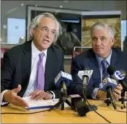  ?? MATT ROURKE — THE ASSOCIATED PRESS FILE ?? Attorneys Thomas Kline, left, and Robert Mongeluzzi, right, take part in a news conference in Philadelph­ia. Amtrak engineer Brandon Bostian won’t be charged in the Amtrak passenger train derailment in Philadelph­ia that killed eight people and injured...