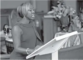  ?? STAFF PHOTOS BY C.B. SCHMELTER ?? School board member Karitsa Mosley Jones gives Hamilton County Department of Education updates Sunday during the Unity Group of Chattanoog­a’s “State of Education in Hamilton County Forum” at Eastdale Village United Methodist Church.