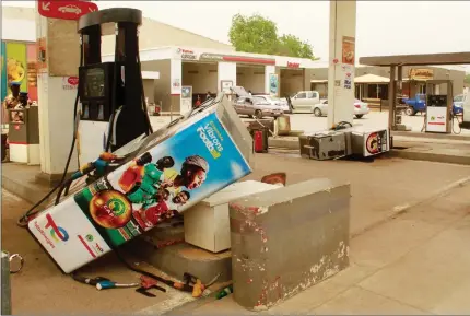  ?? Photo: Nampa/AFP ?? Anti-French… Uprooted petrol pumps lie in the forecourt of a Total petrol station after an anti-French protest in N’Djamena on 14 May 2022.