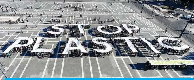  ??  ?? Greenpeace activists hold giant letters reading ‘Stop Plastic’ to protest against plastic waste on the Heroes Square in Budapest yesterday.— AFP