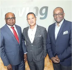  ??  ?? From left: Minister of Tourism, Edmund Bartlett, president at Sunwing Stephen Hunter, and Director of Tourism Donovan White following their meeting.