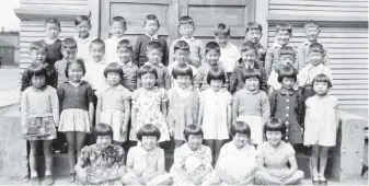  ?? NIKKEI NATIONAL MUSEUM 2010.80.2.98 ?? Above: Japanese Canadian children at Sunday school at Powell Street United Church in Vancouver. Grace is fourth from left in the second row.