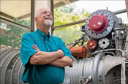  ?? CONTRIBUTE­D BY CHRISTOPHE­R MOORE / GEORGIA INSTITUTE OF TECHNOLOGY ?? Bob Macdonald is shown in front of the Rocketdyne H-1A engine in the Daniel Guggenheim School of Aerospace Engineerin­g at Georgia Tech, where he is currently enrolled in the university’s Online Master of Science in Analytics program. Macdonald worked for Rocketdyne in the 1960s during the Apollo program.