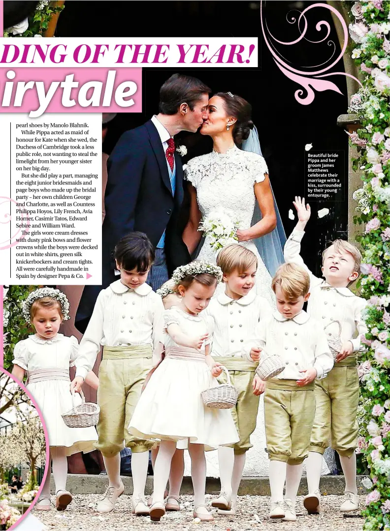  ??  ?? Beautiful bride Pippa and her groom James Matthews celebrate their marriage with a kiss, surrounded by their young entourage.