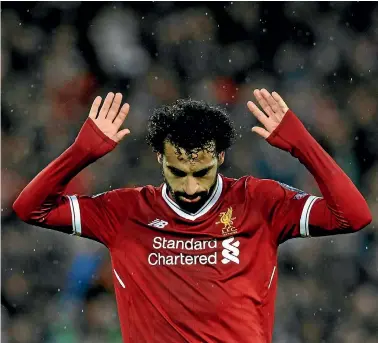  ?? AP ?? Mohamed Salah celebrates after scoring his second goal.
