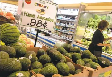  ?? Justin Sullivan Getty Images ?? AVOCADOS at a store in San Francisco. A study being conducted in Parlier, Calif., examines how people describe the f lavor of a good avocado and what components in the fruit contribute to that perceived f lavor.