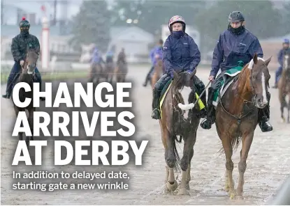  ?? DARRON CUMMINGS/AP ?? Kentucky Derby favorite Tiz the Law (left) is led off the track after a workout Thursday at Churchill Downs.