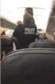  ?? FRAMEGRAB ?? An Air Canada flight from Jamaica to Toronto was diverted to Orlando after authoritie­s say a passenger became aggressive and tried to open a cabin door.