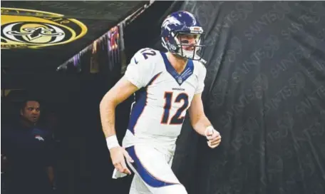  ?? Joe Amon, Denver Post file ?? Broncos second-year quarterbac­k Paxton Lynch received repetition­s with both the first and second teams during practice Wednesday at Dove Valley as starter Brock Osweiler was limited with a sore right shoulder.