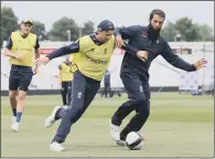  ??  ?? ON THE BALL: England’s Joe Root, left, and Moeen Ali during the nets session at Trent Bridge.