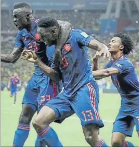  ?? FOTO: GETTY IMAGES ?? Yerry Mina celebra su gol con sus compañeros Davinson Sánchez y Cuadrado