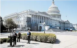  ?? PATRICK SEMANSKY/AP ?? House Minority Whip Steve Scalise, bottom left, speaks to reporters Wednesday with House GOP Conference Chair Liz Cheney and House Minority Leader Kevin McCarthy.