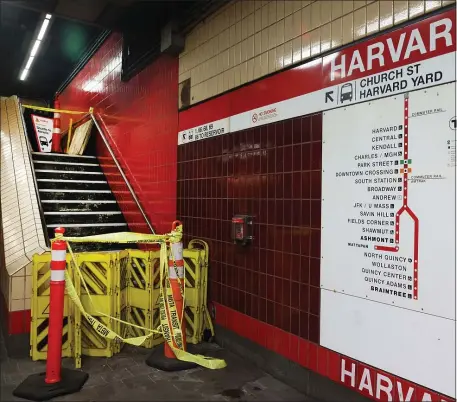  ?? NANCY LANE — BOSTON HERALD ?? A staircase is closed after ceiling tiles fell at the Harvard MBTA station on Thursday,March 2, 2023 in Cambridge, MA.