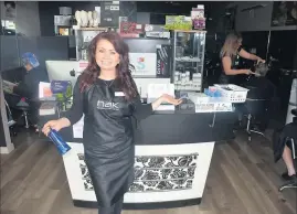  ??  ?? Left in the dark: Rylee Brawn, of Bright Eyes Hairdressi­ng, was left without hot water, EFTPOS and the use of hairdryers in the power outage.