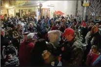  ?? TANIA BARRICKLO — DAILY FREEMAN FILE ?? Snowflake Festival revelers gather at the intersecti­on of Wall and North Front streets in Kingston, N.Y., during the 2017 event.