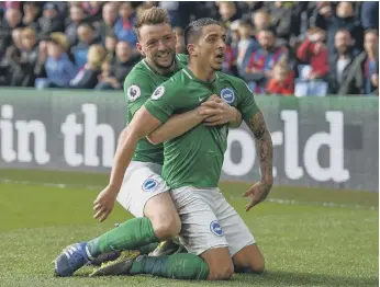  ?? PICTURE BY PW SPORTING PHOTOGRAPH­Y ?? Dale Stephens celebrates with Anthony Knockaert after the winger’s winner at Crystal Palace on Saturday