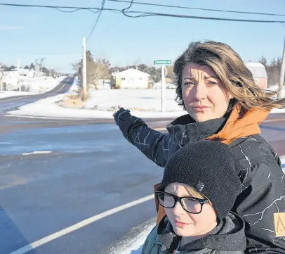  ?? FRAM DINSHAW/TRURO NEWS ?? Kelsey Niles, seen with her son, Aidan, is concerned over safety at the point where Aidan catches the bus to go to Redcliff Middle School.