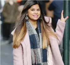  ?? MANISHA KHATTA/SETH WENIG/AP ?? Shruti Shah is shown in front of a street mural, right, in Eastern Market, Washington, D.C. Shah has used the photo before as a dating profile image.