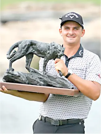  ?? PHOTOGRAPH COURTESY OF europeanto­ur.com ?? CHRISTIAAN Bezuidenho­ut wins his second title in the European Tour.